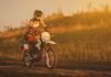 Riding a motorcycle has the same effect as exercise and meditation combined Happy female biker