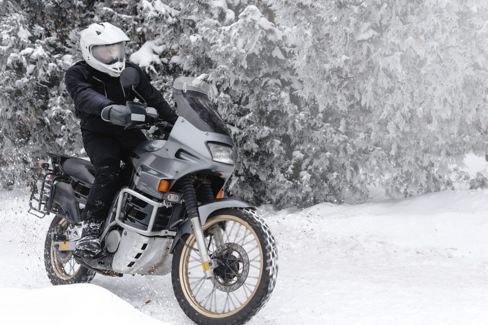 Motorbike rider snow