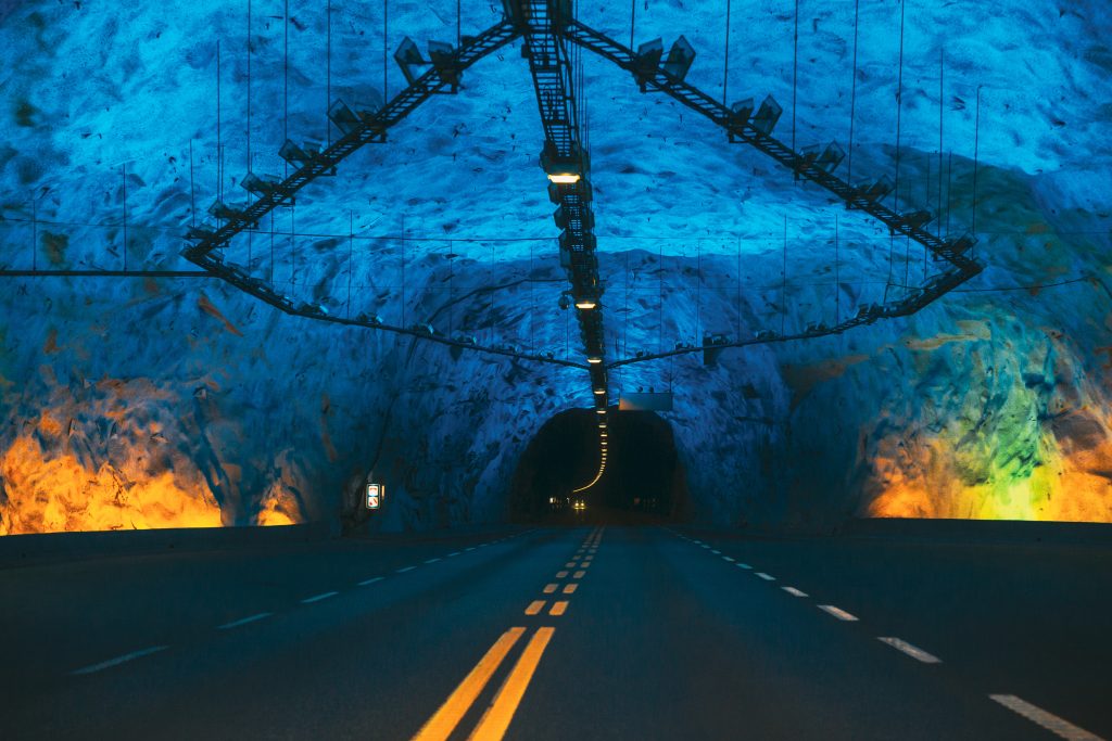 Laerdal Tunnel, Norway. Road On Illuminated Tunnel In Norwegian