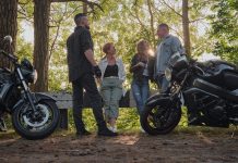 Why aren’t younger generations buying motorcycles? A company of friends travel together on motorcycles, stopped at the roadside, have fun and drink tea